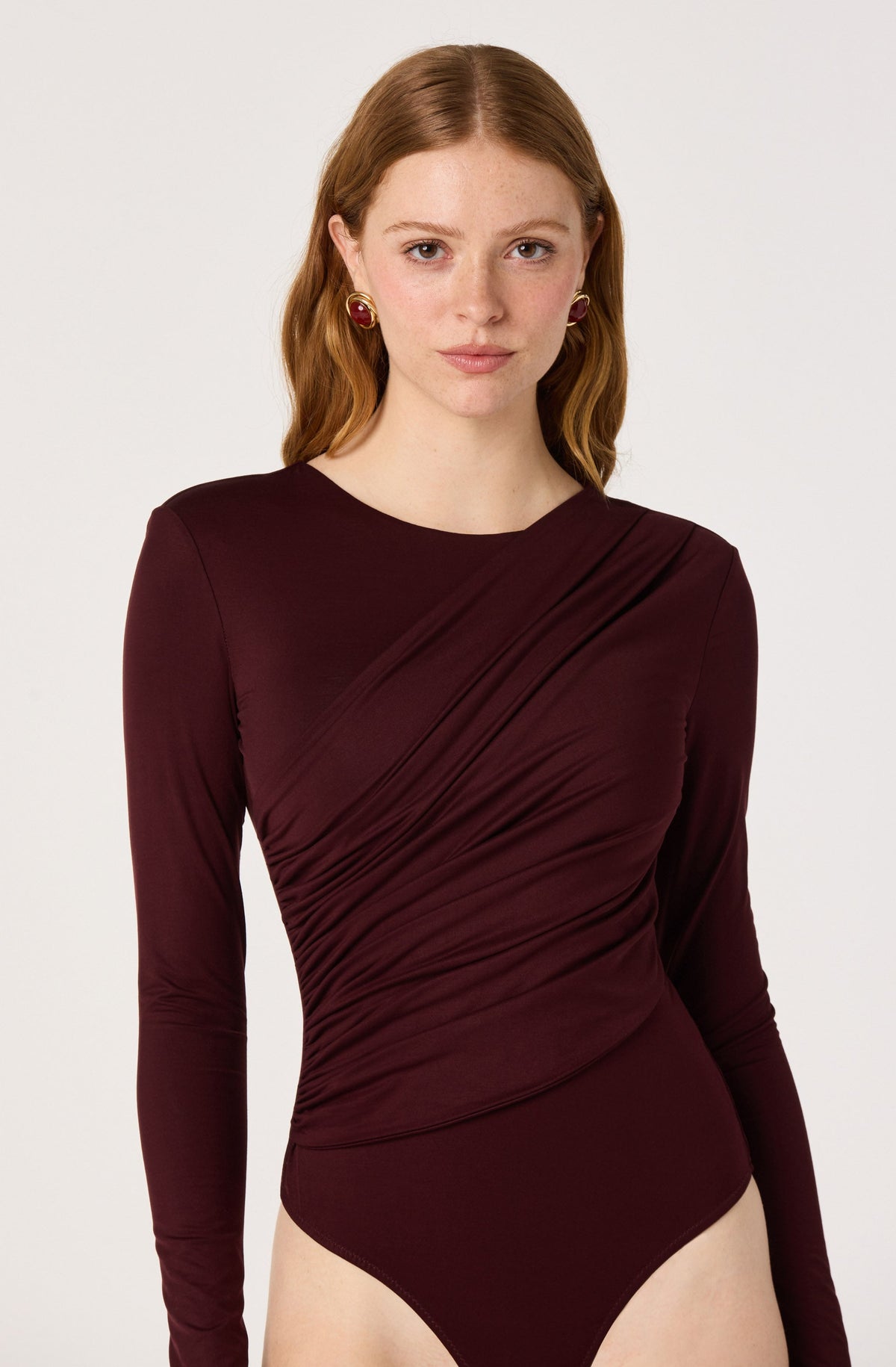 Ciarda Ruched Faux Wrap Bodysuit