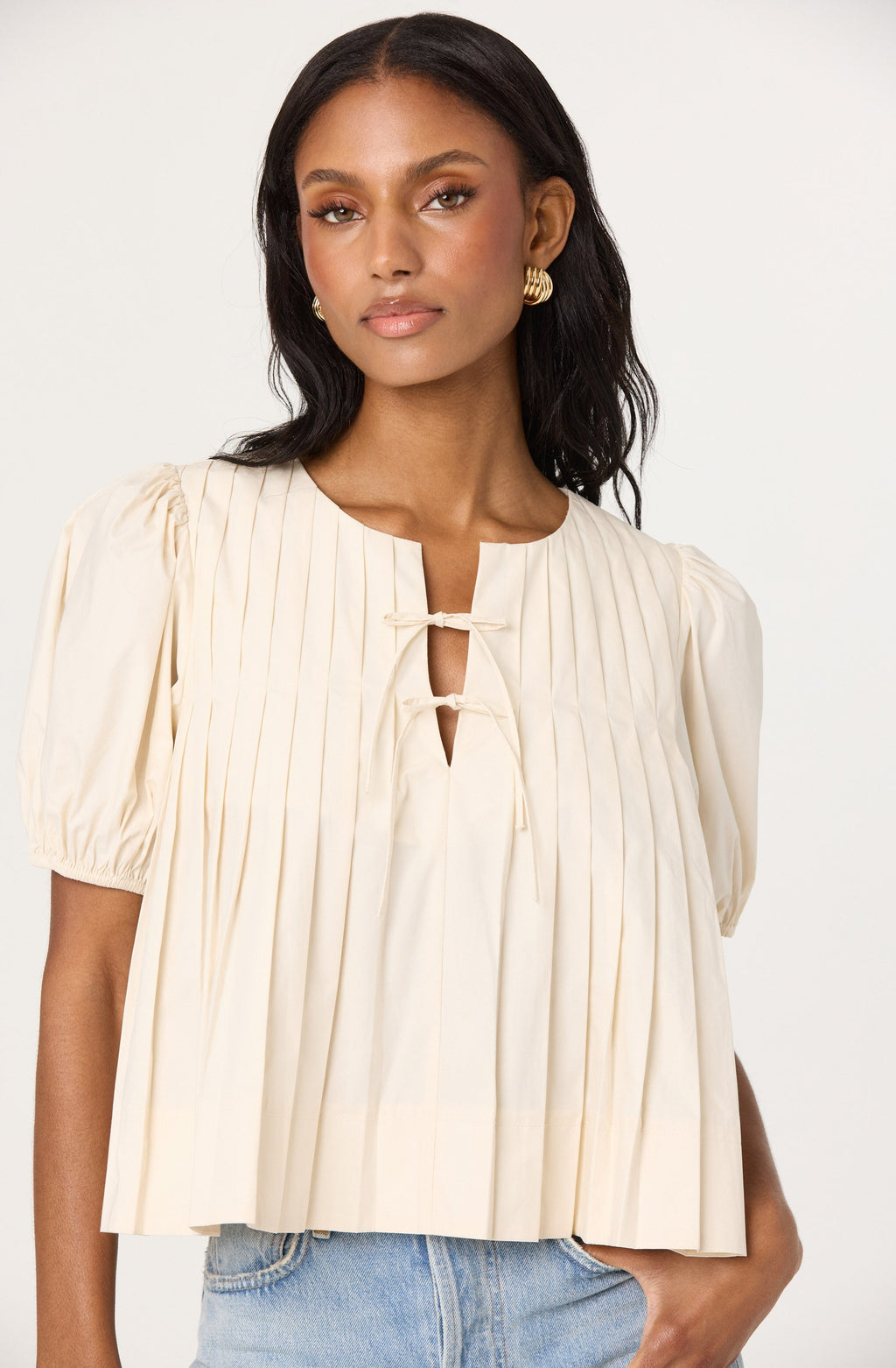 Pleated swing top